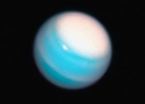 Luna necunoscută a planetei Uranus, descoperită recent cu ajutorul telescopului spațial James Webbea noastră”