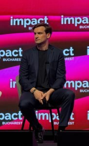 Deputatul Andrei Baciu, Prezent la Impact Bucharest: Un Discurs de Impact