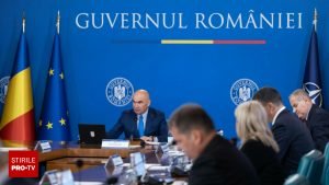 Guvernul Bolojan taie fonduri pentru ministere la rectificarea bugetară