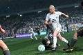 EA FC 26 Gameplay with a player committing a slide tackle