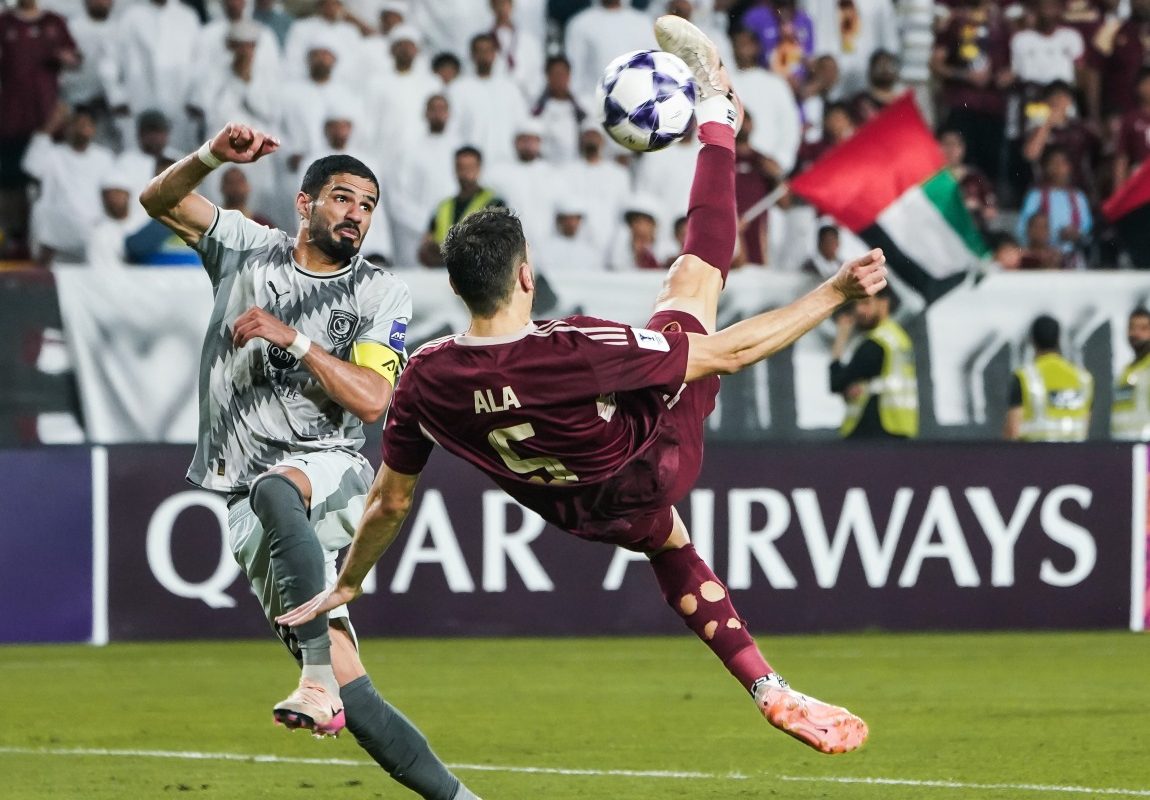 Al Wahda’s Ala Zouhir scores with a spectacular overhead kick.