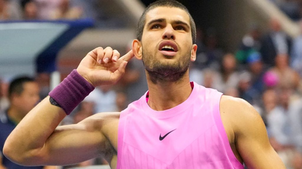 Carlos Alcaraz, of Spain, reacts after scoring a point against Jannik Sinner, of Italy, during the men's singles final of the U.S. Open tenn