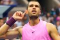 Carlos Alcaraz, of Spain, reacts after scoring a point against Jannik Sinner, of Italy, during the men's singles final of the U.S. Open tenn