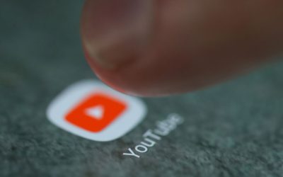 The-YouTube-app-logo-is-seen-on-a-smartphone-in-this-picture-illustration-taken-September-15-2017.-R.jpeg