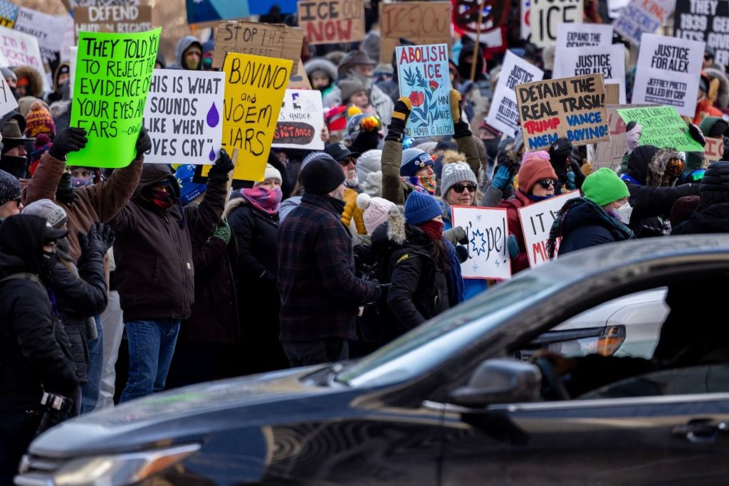 Demonstrators against the ongoing Immigration and Customs Enforcement deployment during a protest at the Government Plaza in Minneapolis on Sunday, Jan. 25, 2026.