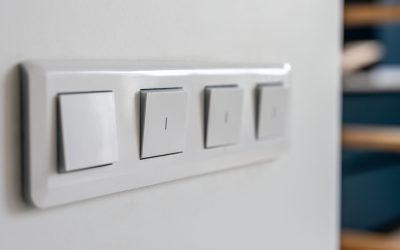 four-light-switches-macro-with-bokeh-background-minimal-design-scaled.jpg