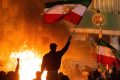 iran-proteste-steag-foc.jpg