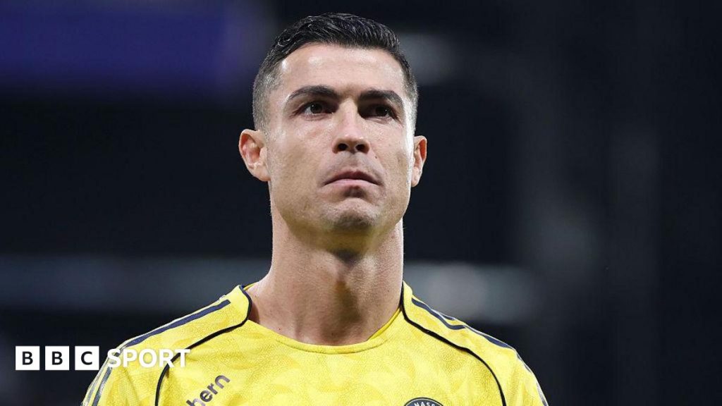 Head-and-shoulders image of Cristiano Ronaldo in a yellow Al-Nassr shirt
