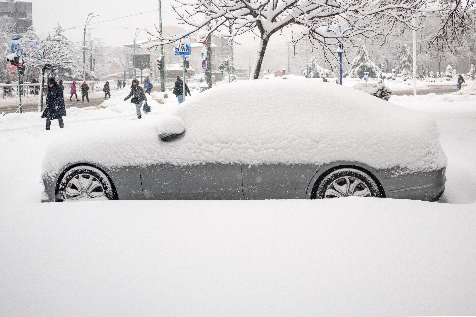 Prognoza actualizată: până când va mai ninge în București
