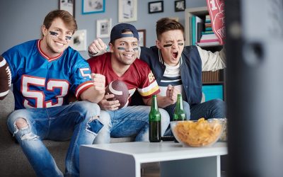 men-watching-football-eating-chips.jpg