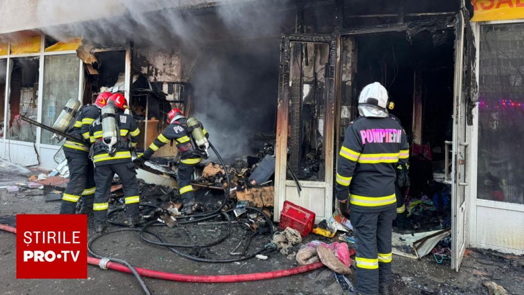 Un incendiu puternic a izbucnit într-un magazin mixt situat la parterul unui bloc din București, mobilizând rapid echipaje numeroase de intervenție
