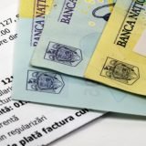 Proiect în Parlament: Facturi doar la cursul BNR, pentru români