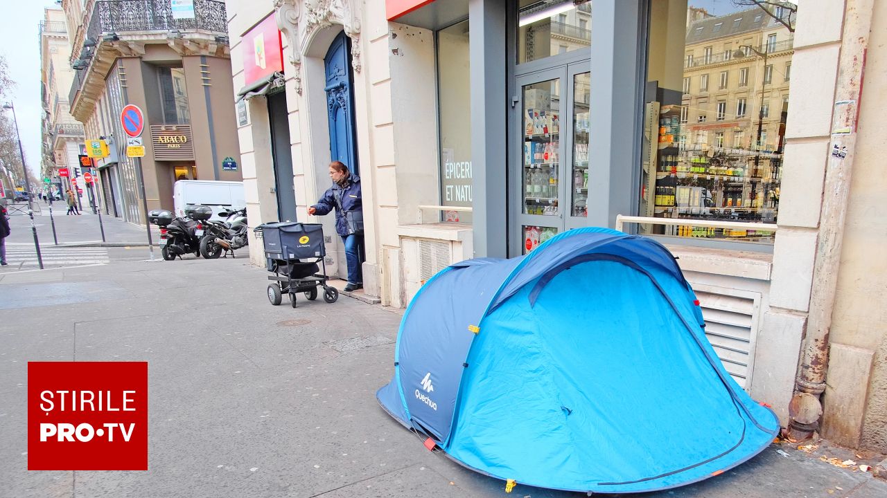 Un bărbat fără adăpost, angajat la magazinul în fața căruia cerșea. Continuă să doarmă într-un cort, dar are un loc de muncă