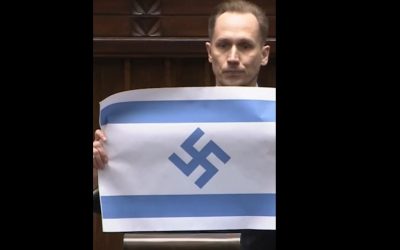 Deputat extremist, șoc în Polonia: A fluturat steag israelian cu svastică