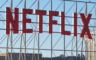In an aerial view, the Netflix logo is displayed above Netflix corporate offices.