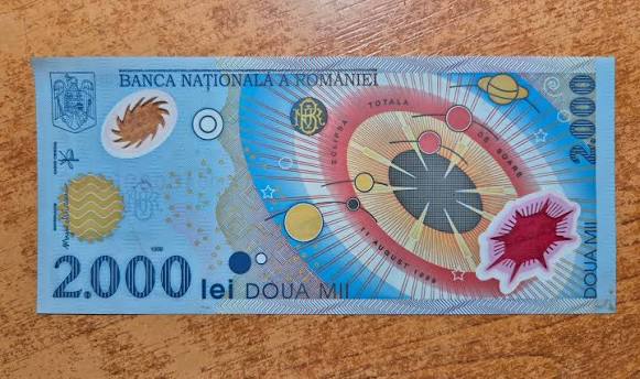Bancnota de 2.000 de lei cu eclipsa: Cât valorează astăzi pentru colecționari